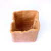 A handcrafted jute planters for event return gifts.