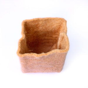 A handcrafted jute planters for event return gifts.