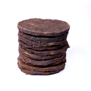 Hand-pressed sacred cowdung cakes for Agnihotra rituals by Nativus Farms.