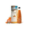 A premium amber glass bottle of Nativus Farms Sea Buckthorn Juice Pulp surrounded by fresh, vibrant golden berries.